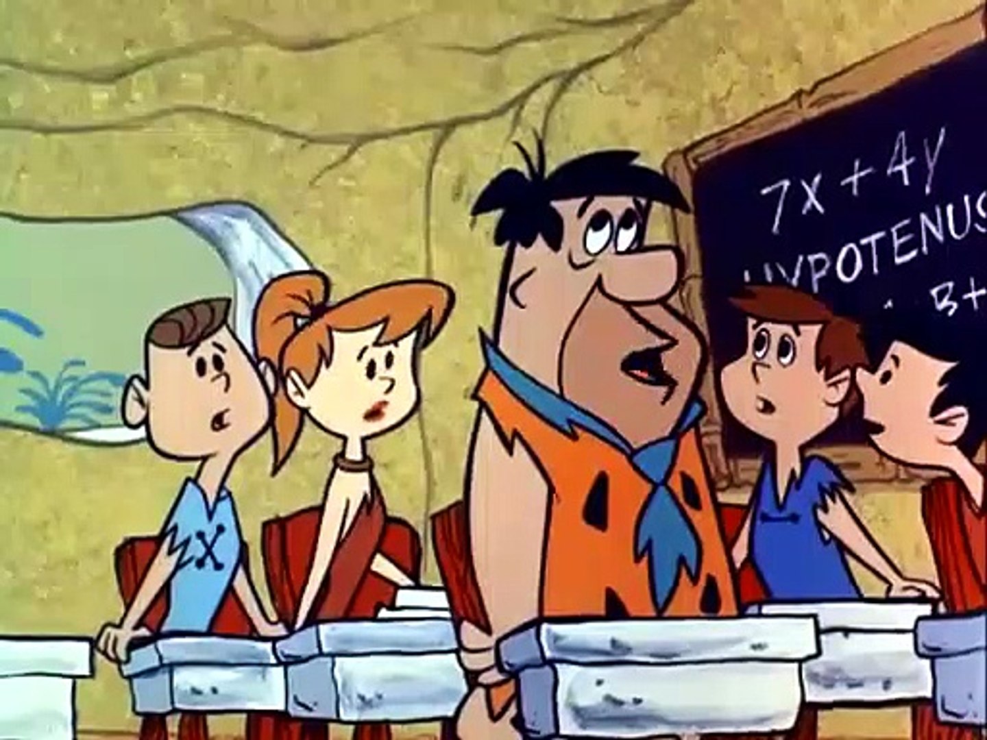 Fred Flintstone in school.